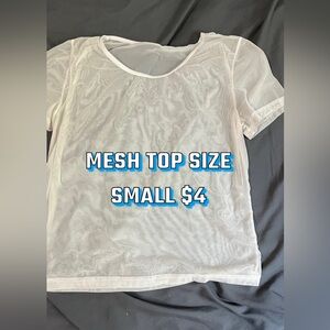 A white mesh cover tee
